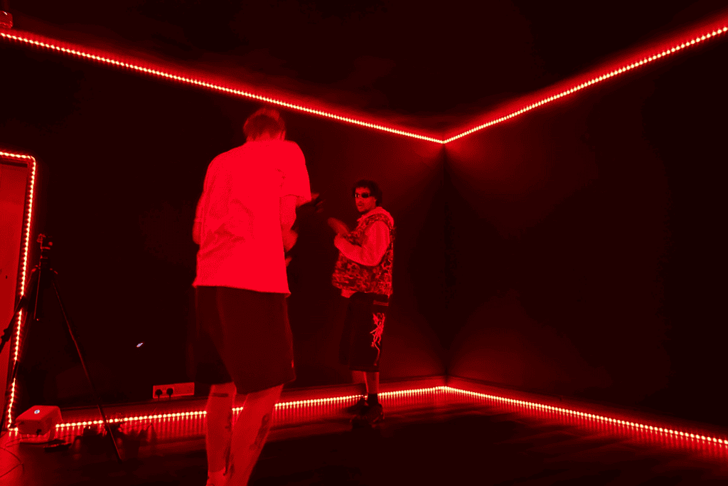 Blackout film studio with red LED lighting outlines
